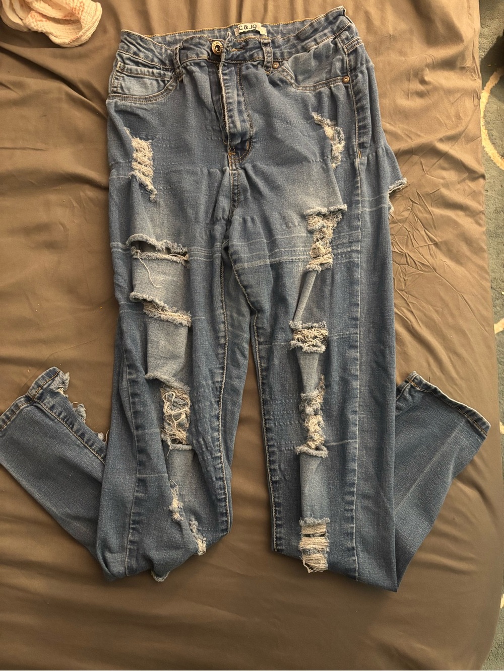 Distressed Skinny Jeans in Light Blue Wash